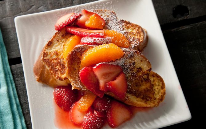 challah french toast recipe with orange and strawberries