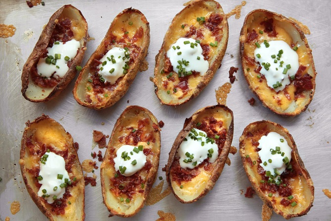 baked potato skins with sour cream, cheese, and bacon