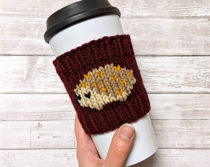 knit hedgehog coffee cozy