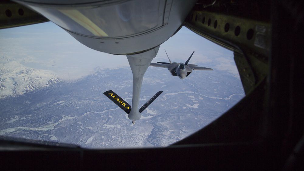 This is the boom system of refueling. The fighter jet is an F-22. May 1, 2014.