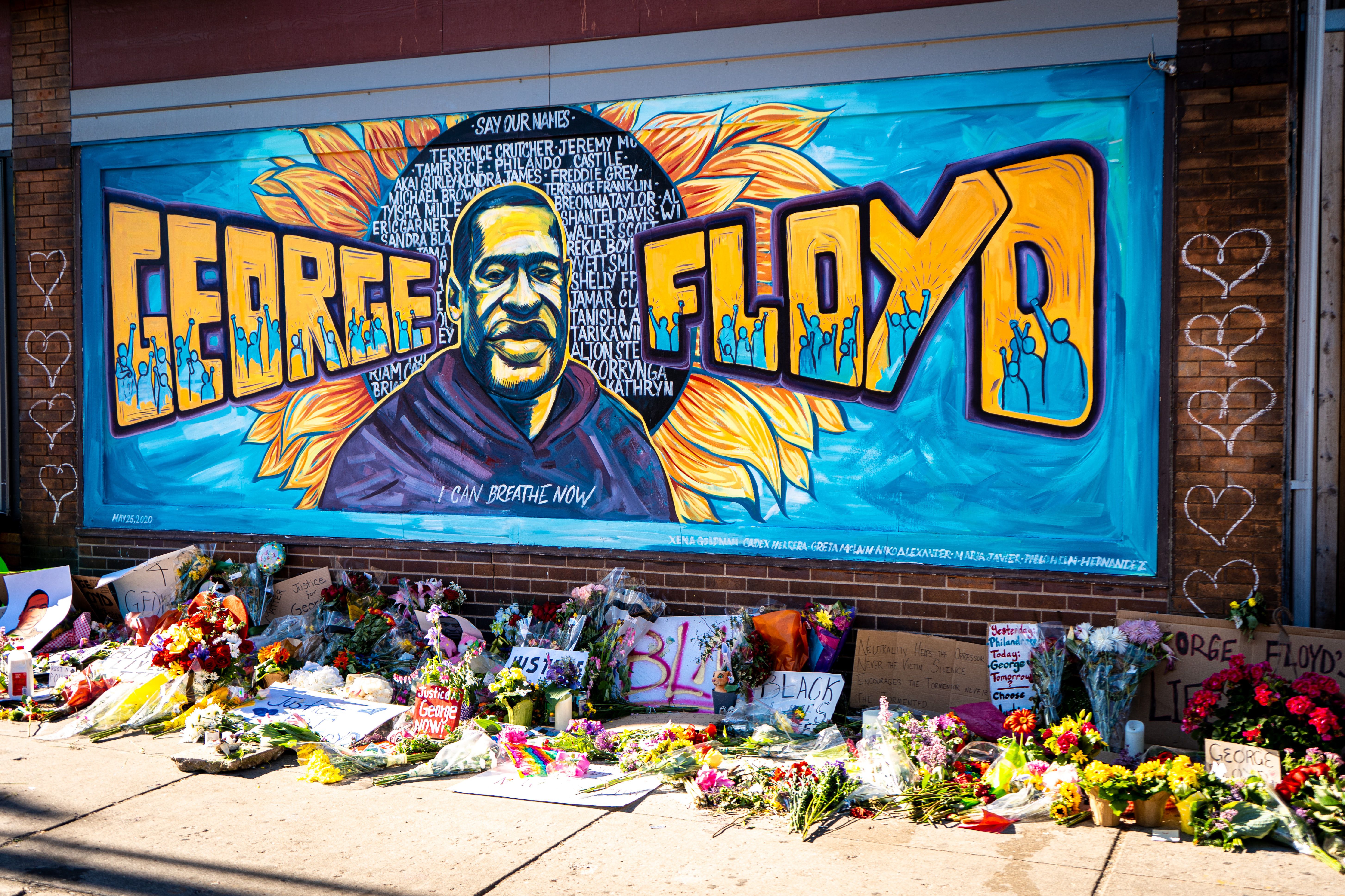 A mural in Minneapolis, Minnesota, made by community artists, commemorates George Floyd, who was killed while being restrained by city police officers in May. Video of his death, taken primarily by a teenager, has since flooded the internet.