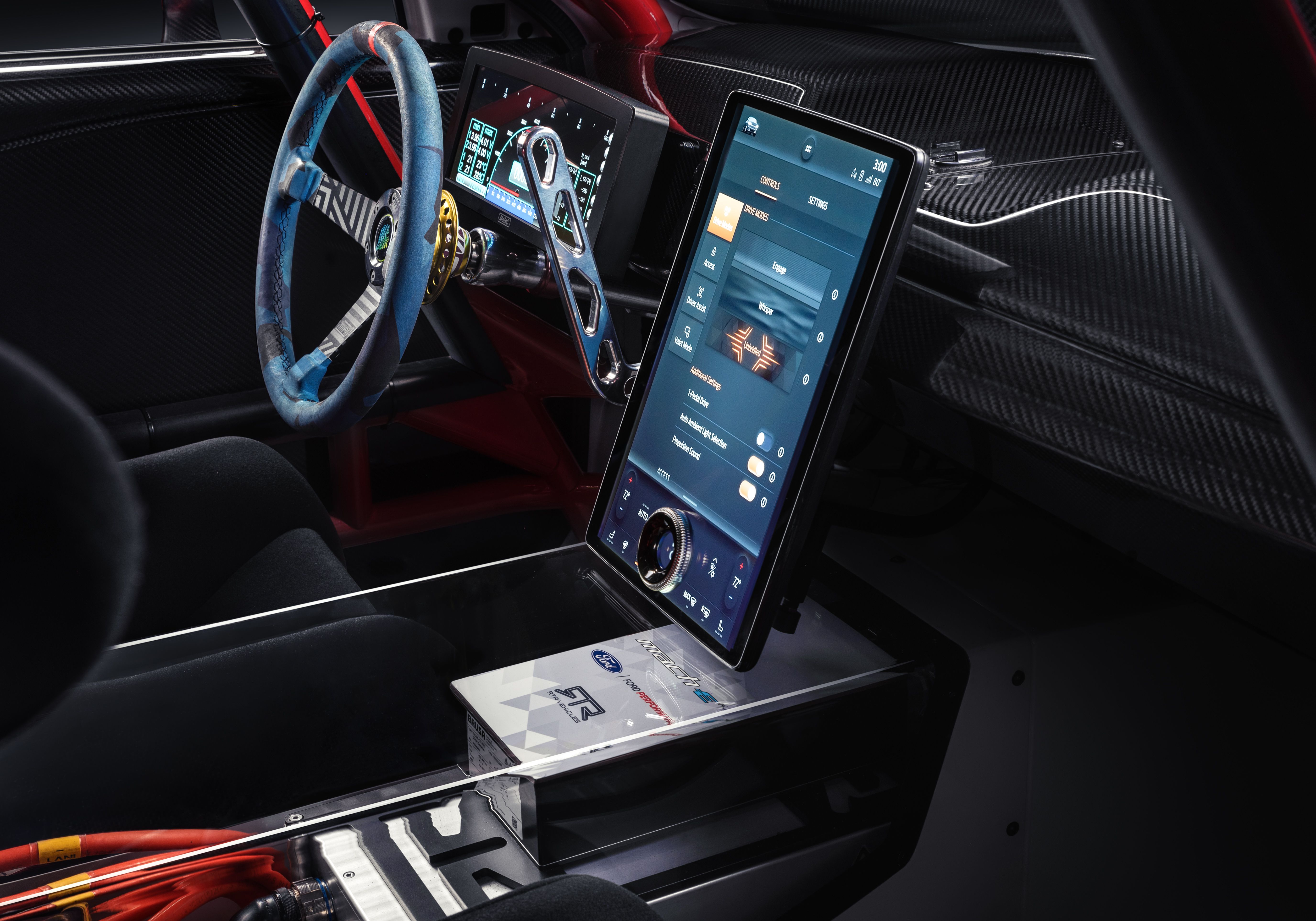 All electric cars must have giant screens. It's the rule. Also note the handbrake lever next to the steering wheel.